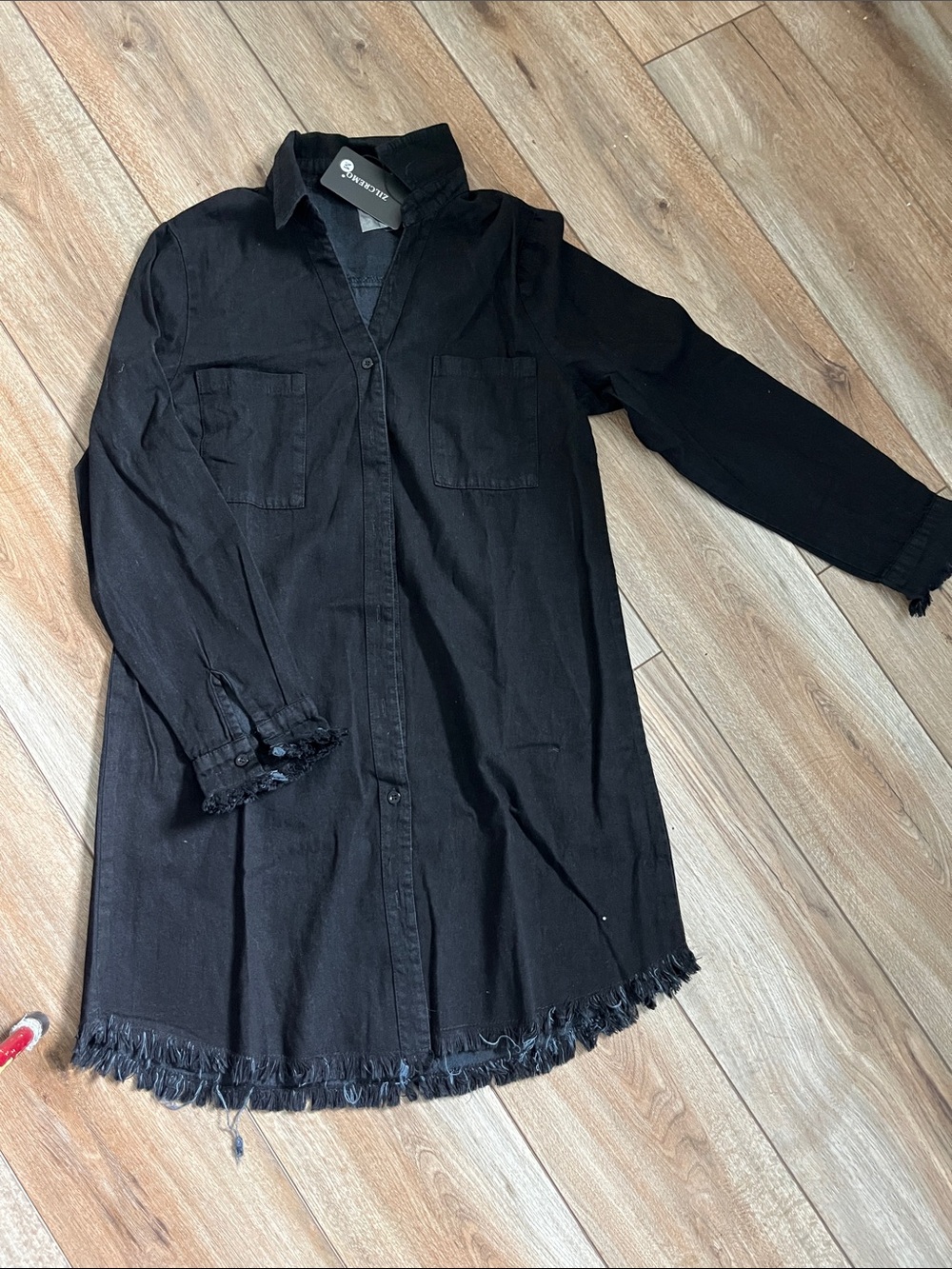 Black shirt dress. Frayed edges